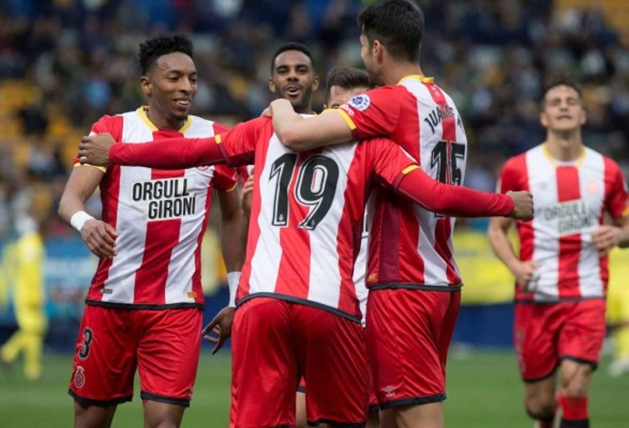 Los compañeros del Choco Lozano festejando con sus compañeros.