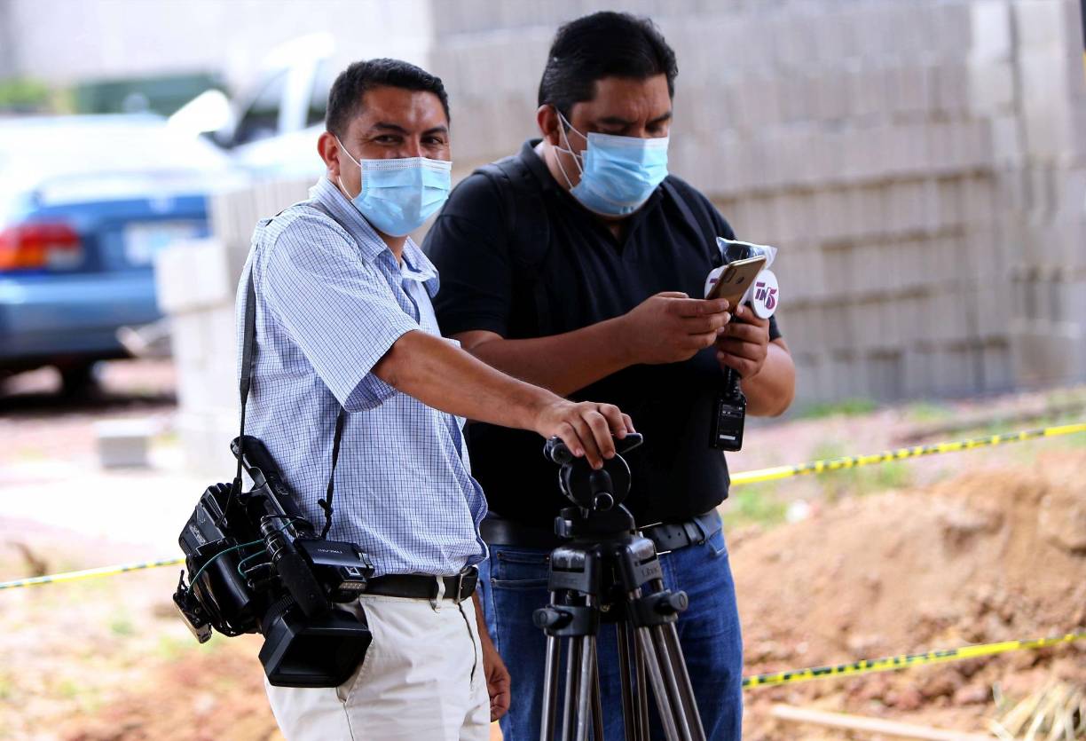 7. Periodistas, fotógrafos y camarógrafos.