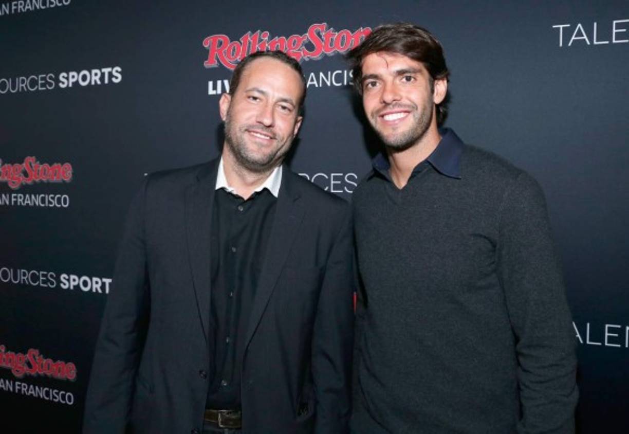 Kaká y David Spencer.