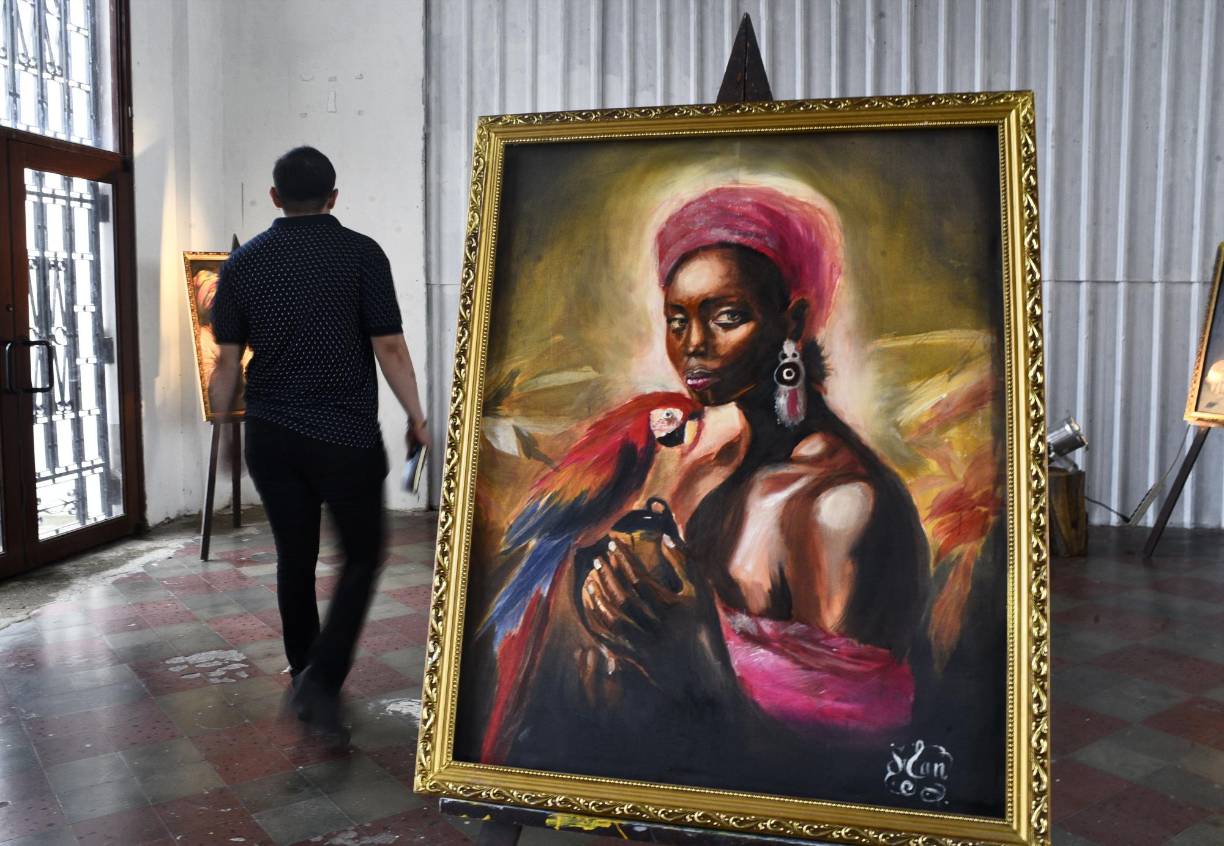 Fotos: Stanley Banegas expone sus pinturas en homenaje a los garífunas