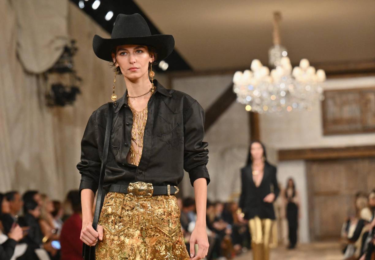 A model walks the runway for the Ralph Lauren Spring Summer 2024 runway show during New York Fashion Week in New York on September 8, 2023. (Photo by ANGELA WEISS / AFP)