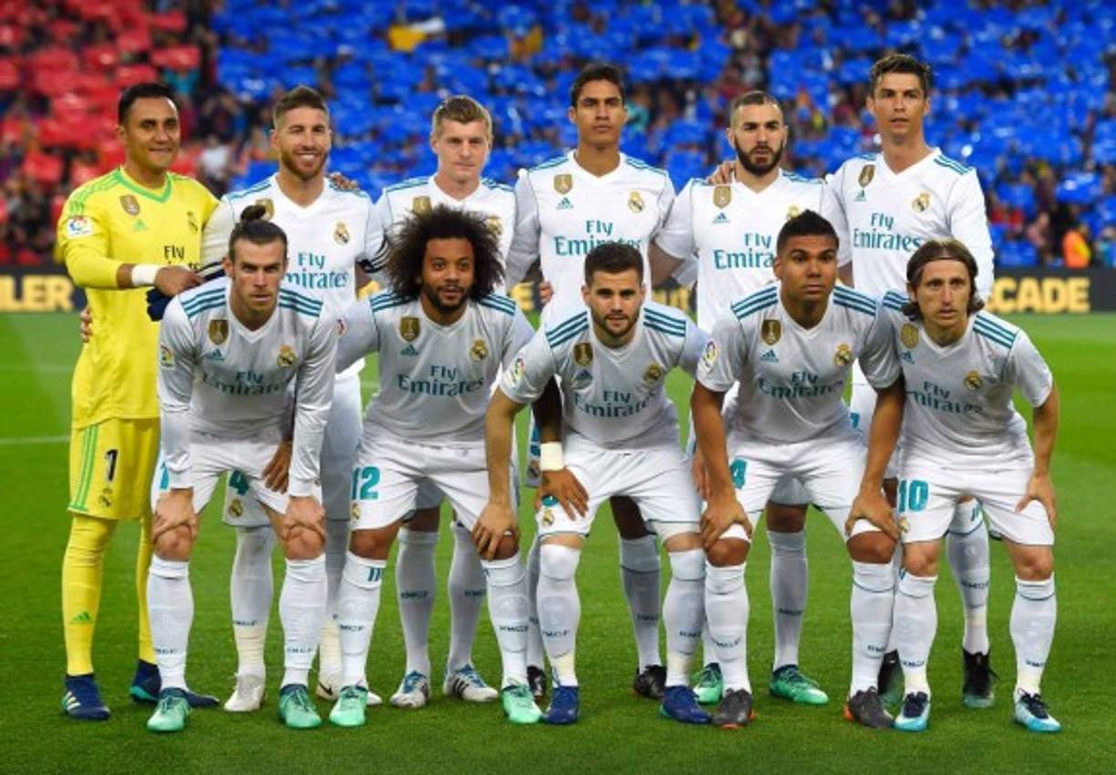 Barcelona's Uruguayan forward Luis Suarez celebrates after scoring during the Spanish league football match FC Barcelona against Sevilla FC at the Camp Nou stadium in Barcelona on October 20, 2018. (Photo by LLUIS GENE / AFP)