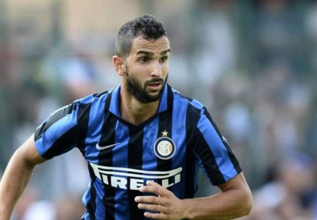 Arsenal's Welsh midfielder Aaron Ramsey celebrates scoring his team's third goal during the English Premier League football match between Arsenal and Fulham at the Emirates Stadium in London on January 1, 2019. (Photo by Glyn KIRK / AFP) / RESTRICTED TO EDITORIAL USE. No use with unauthorized audio, video, data, fixture lists, club/league logos or 'live' services. Online in-match use limited to 120 images. An additional 40 images may be used in extra time. No video emulation. Social media in-match use limited to 120 images. An additional 40 images may be used in extra time. No use in betting publications, games or single club/league/player publications. /