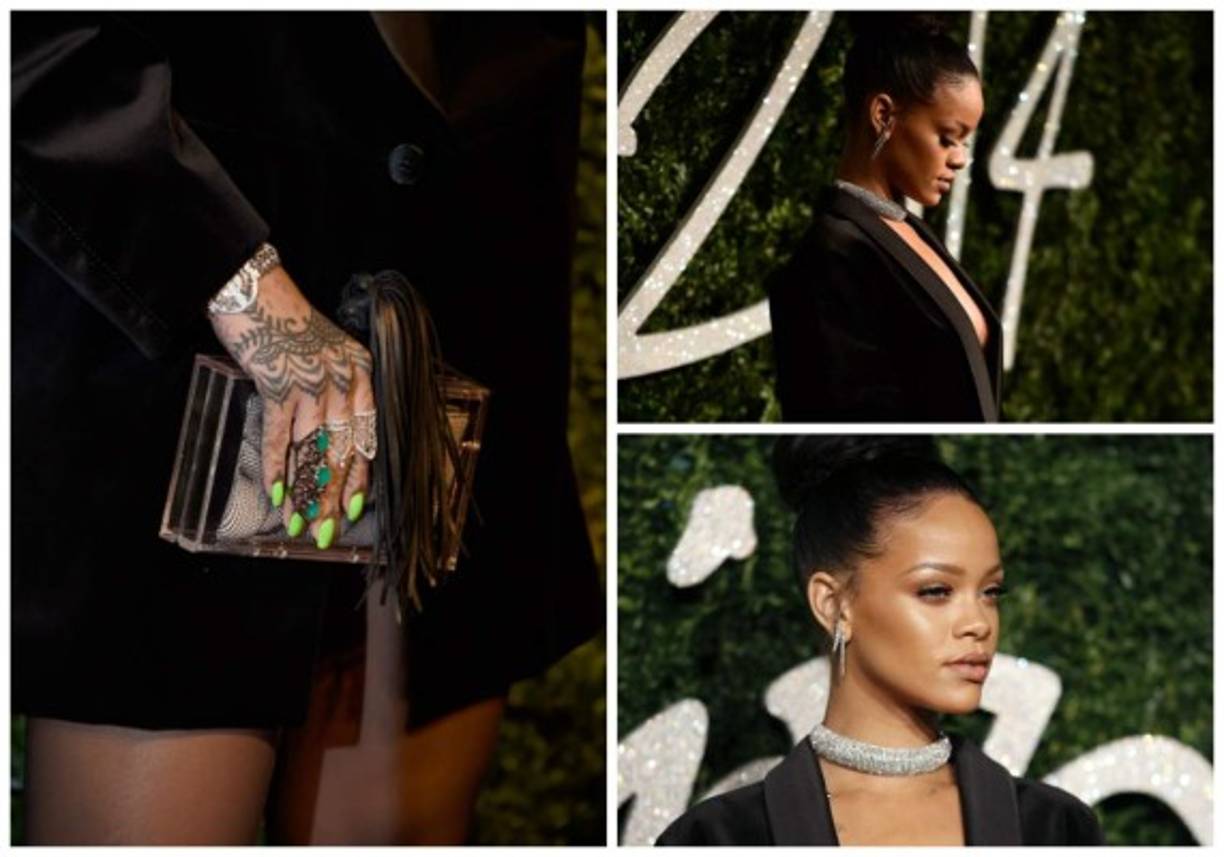 Rihanna desfiló por la alfombra roja de los British Fashion Awards 2014 con un atrevido y sexy escote.