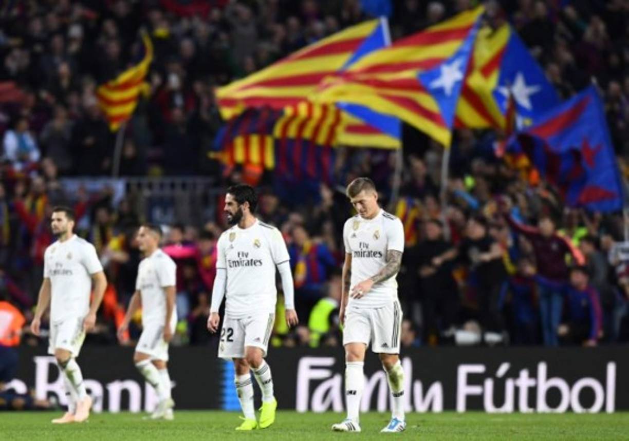 Real Madrid's Spanish defender Sergio Reguilon bends down at the end of the Spanish Copa del Rey (King's Cup) semi-final second leg football match between Real Madrid and Barcelona at the Santiago Bernabeu stadium in Madrid on February 27, 2019. (Photo by JAVIER SORIANO / AFP)