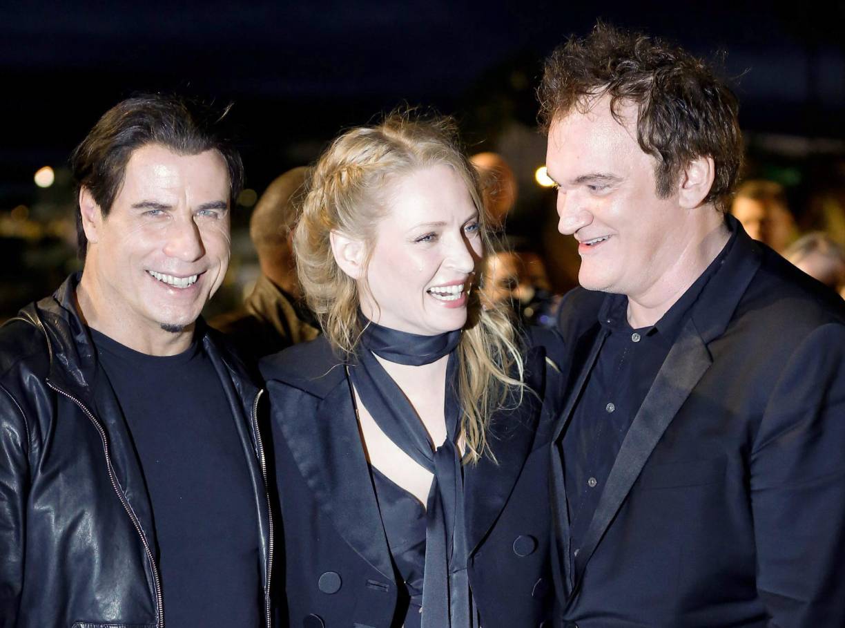 John Travolta, Uma Thurman y Quentin Tarantino, un trío esencial en 'Pulp Fiction'.
