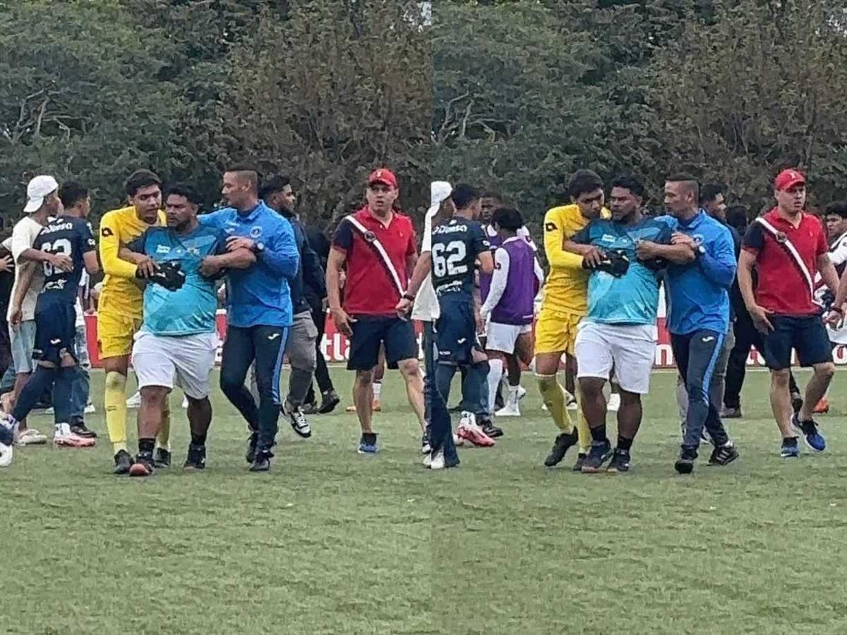 Este padre de familia perdió los papeles y se fue a los golpes. Tuvo que ser controlado por el portero de Olimpia y un elemento del staff técnico de Motagua.