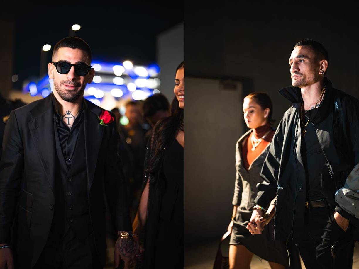 La llegada de Ilia Topuria y Max Holloway al Etihad Arena de la capital de Emiratos Árabes Unidos. Los dos peleadores llegaron de negro y acompañados de sus parejas. El español llegó con una rosa roja