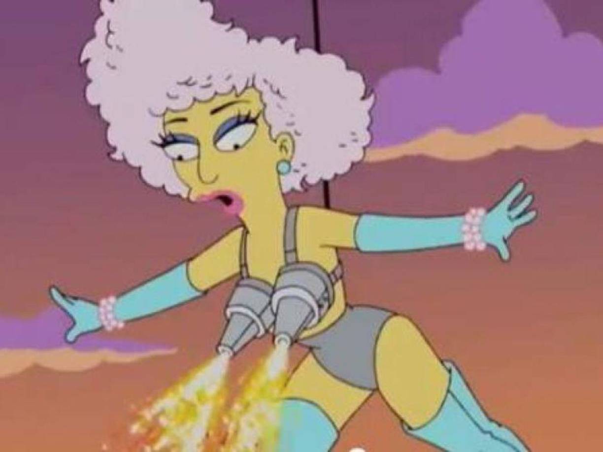 Lady Gaga sobrevolando al público en una actuación (capítulo de 2012 que avanzó lo que haría en la Superbowl de 2017).