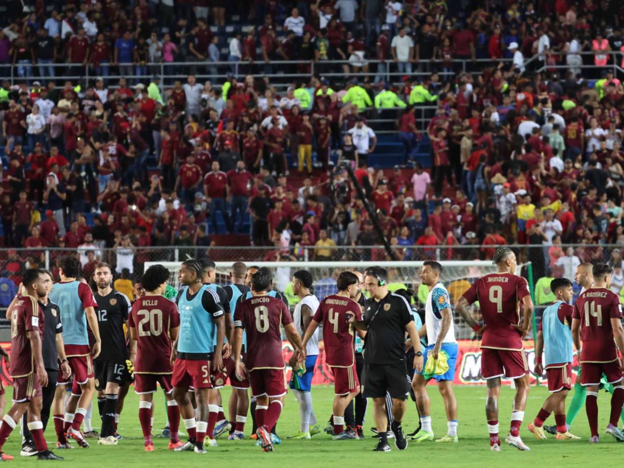 El pitazo final llegó y Venezuela celebró el empate. 