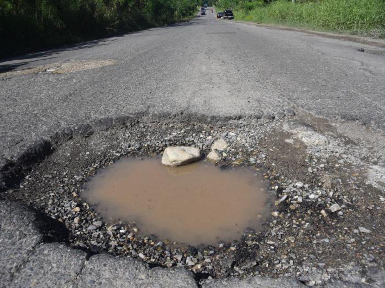Listos fondos para reconstruir la destruida carretera entre La Ceiba y Trujillo