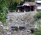 Basura, aguas negras y malos olores rodean a miles de familias en San Pedro Sula.