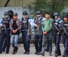 Siete capturados en Arizona, Atlántida, comparecen a audiencia inicial bajo fuertes medidas de seguridad.