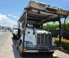 Grúa y rastra permanecían bajo custodia policial frente a la posta de La Ceiba, Atlántida, donde fueron saqueados por desconocidos.
