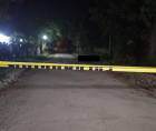 Escena donde fue encontrada asesinada una mujer en la colonia Cerrito Lindo de San Pedro Sula.