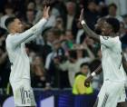 Jugadores del Real Madrid celebrando el gol de Vinicius ante el Benfica en la Champions League.