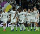 Jugadores del Real Madrid celebrando el gol de Mbappé ante el Mónaco por la Champions League.