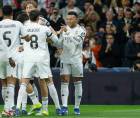 Jugadores del Real Madrid celebrando el gol de Mbappé ante el Mónaco por la Champions League.
