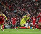 Jugadores del Liverpool celebrando su gol ante el Tottenham.