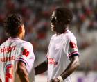 El centrocampista Raúl García celebrando su gol con Edwin Rodríguez.