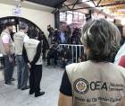 Observadores electorales de la OEA durante las elecciones generales del 30 de noviembre den Honduras.