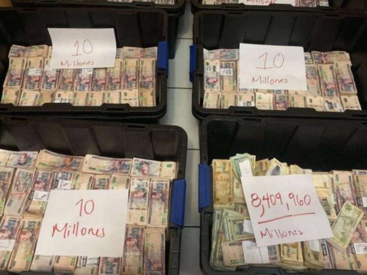 En cajas de plástico, de cartón y bolsas fueron hallados alrededor de 158 millones de lempiras en las siete sedes de la empresa.