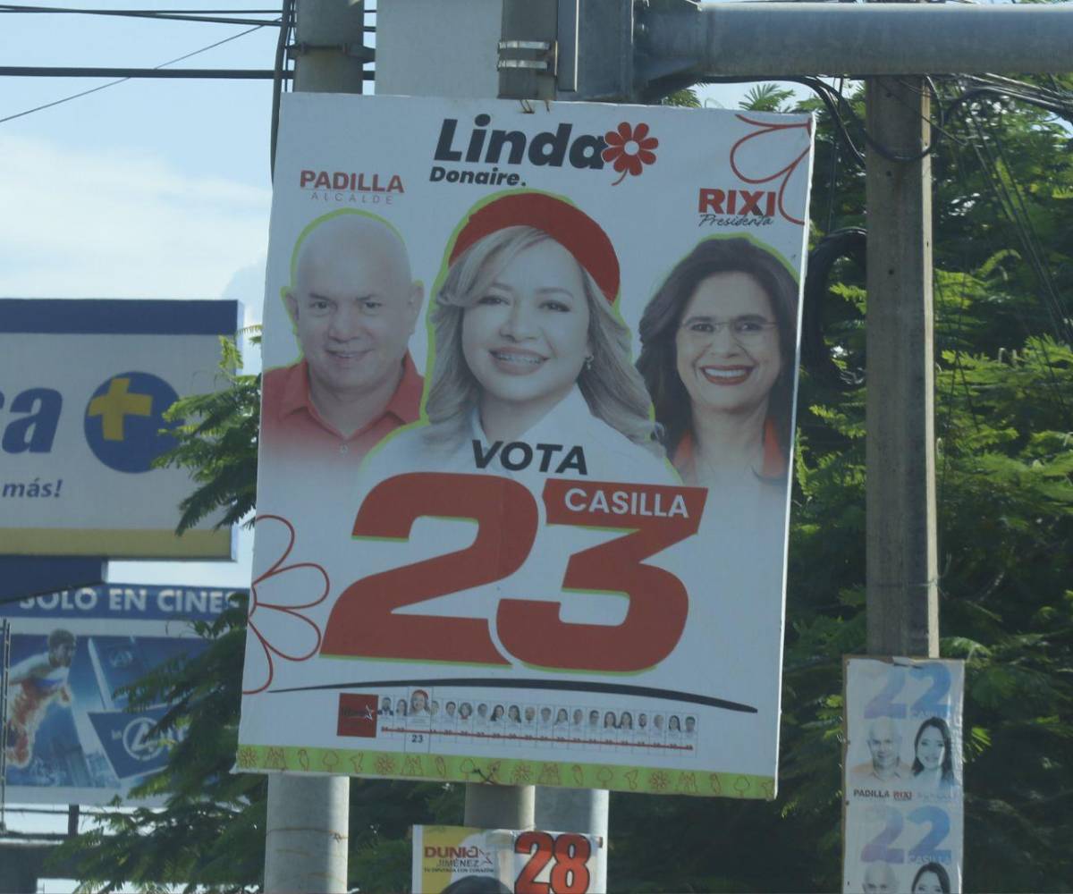 Linda Donaire aparece principalmente en banners, evitando figurar junto a sus compañeros en las vallas de las calles de Cortés.