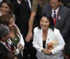 La presidenta de Perú, Keiko Fujimori (c), reacciona durante la vigésimo primera Ceremonia de Acción de Gracias por el Perú este jueves, celebrada por las iglesias evangélicas del país andino, en Lima (Perú). EFE/ Paolo Aguilar