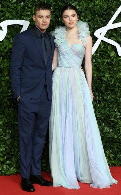 British singer Liam Payne and his partner Maya Henry pose on the red carpet upon arrival at The Fashion Awards 2019 in London on December 2, 2019. - The Fashion Awards are an annual celebration of creativity and innovation will shine a spotlight on exceptional individuals and influential businesses that have made significant contributions to the global fashion industry over the past twelve months. (Photo by Isabel Infantes / AFP) / RESTRICTED TO EDITORIAL USE - NO MARKETING NO ADVERTISING CAMPAIGNS