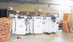 Con camiones y rastras saquean bodegas de Dima en San Pedro Sula