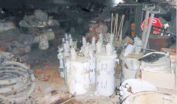 Con camiones y rastras saquean bodegas de Dima en San Pedro Sula