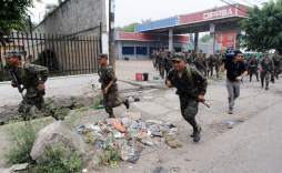 Militares suben a los buses para cuidar pasajeros en Tegucigalpa