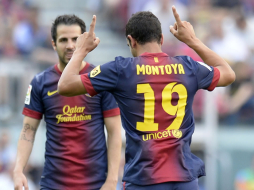 Barcelona de los récords se da un festín contra un Málaga indolente