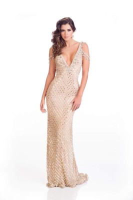 Paulina Vega, Miss Colombia 2014 poses is her evening gown upon arriving to Trump National Doral MiamI. The 63rd Annual MISS UNIVERSE® Pageant contestants are touring, filming, rehearsing and preparing to compete for the DIC Crown in Doral-Miami. Tune in to the NBC telecast at 8:00 PM ET on January 25, 2015 live from the FIU Arena to see who will become the 63rd Miss Universe. HO/Miss Universe Organization L.P., LLLP --LIGHT RETOUCHING--