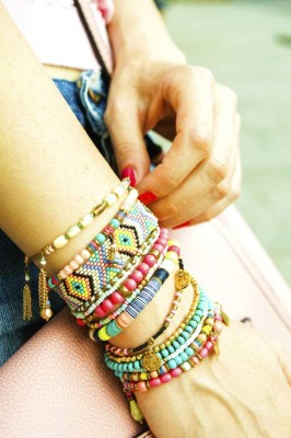 Stylish bracelets on female hand