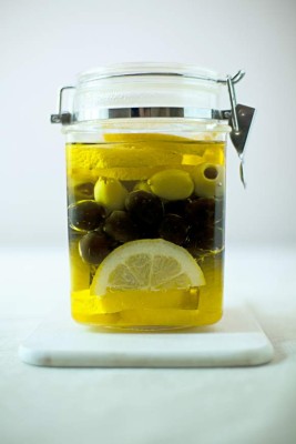 Homemade aromatic olive oil with lemmon.