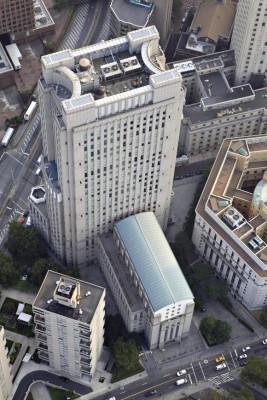 The Daniel Patrick Moynihan Federal Courthouse stands in downtown Manhattan in this aerial photograph taken over New York, U.S., on Wednesday, July 7, 2010. Manhattan's office vacancy rate dropped for the first time in three years in the second quarter as almost 7 million square feet of leases were signed, brokerage Cushman & Wakefield Inc. said. The falling vacancy in New York, the country's biggest and costliest office market, contrasted with the national vacancy rate of 17.4 percent, the highest level in 17 years. Photographer: Daniel Acker/Bloomberg via Getty Images