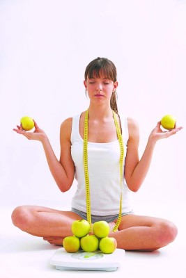 Woman balancing with apple in her hands, canon 1Ds mark III