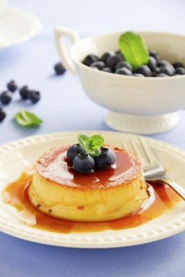 Creme caramel with fresh blueberries.