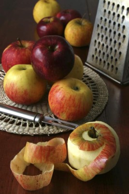 Colorful fresh organic apples ready to be peeled and grated for apple pie