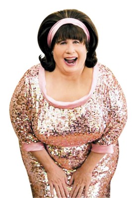 Travolta, con alma femenina