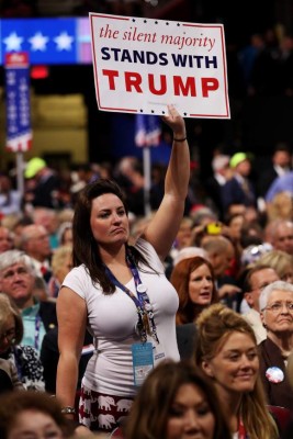 CLEVELAND, OH - JULY 19: A delegate holds a sign in support of Donald Trump, takes part in the convention openings on the second day of the Republican National Convention on July 19, 2016 at the Quicken Loans Arena in Cleveland, Ohio. An estimated 50,000 people are expected in Cleveland, including hundreds of protesters and members of the media. The four-day Republican National Convention kicked off on July 18. John Moore/Getty Images/AFP