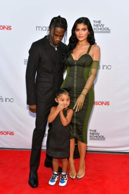NEW YORK, NEW YORK - JUNE 15: Travis Scott, Kylie Jenner, and Stormi Webster attend the The 72nd Annual Parsons Benefit at Pier 17 on June 15, 2021 in New York City. Craig Barritt/Getty Images for The New School/AFP (Photo by Craig Barritt / GETTY IMAGES NORTH AMERICA / Getty Images via AFP)