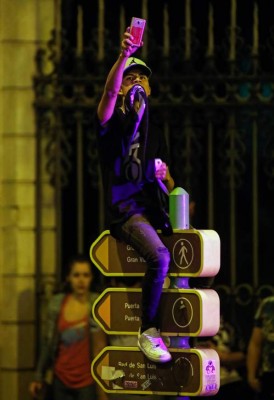 Bandera de Honduras en festejos de aficionados del Real Madrid en España