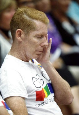 Richard Lamberty of The Orlando Gay Chorus sheds a tear during a memorial service on the first anniversary of the Pulse nightclub shootings, at the Veterans Administration Medical Center in Orlando, Florida on June 8, 2017. In the deadliest mass shooting in US history, 49 people were killed at the gay nightclub on June 12, 2016. / AFP PHOTO / Gregg Newton / Gregg Newton