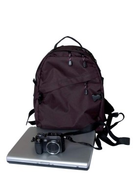 Traveler stuff - camera, notebook and backpack