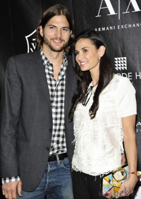 Actors Ashton Kutcher and Demi Moore attend the first annual Stephan Weiss Apple Awards at the Urban Zen Center on Thursday, June 9, 2011 in New York. (AP Photo/Evan Agostini)