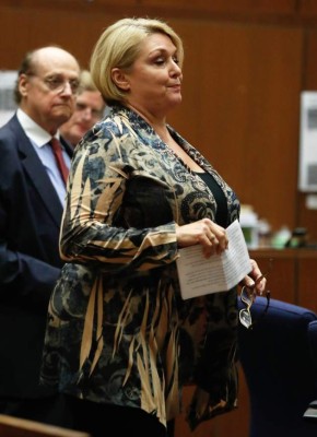 (FILES) This file photo taken on June 9, 2017 shows Samantha Geimer walking to the podium to address the court in Los Angeles, California.Judge Brown on August 18, 2017, rejected a bid by Geimer to close the case against director Roman Polanski who pleaded guilty to raping Geimer when she was a teenager in 1977. Brown said in a 10-page ruling that while Geimer, who was 13 at the time, had clearly suffered because of the case, he could not dismiss it 'merely because it would be in the victim's best interest.' Brown said Polanski must appear in court for the matter to be resolved. / AFP PHOTO / POOL / Paul BUCK