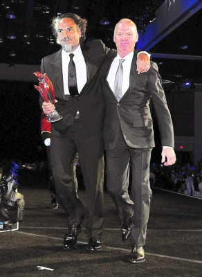 PALM SPRINGS, CA - JANUARY 03: Director Alejandro Gonzalez Inarritu (L) accepts the Director of the Year Award from actor Michael Keaton onstage during the 26th Annual Palm Springs International Film Festival Awards Gala at Palm Springs Convention Center on January 3, 2015 in Palm Springs, California. (Photo by Michael Buckner/Getty Images for PSIFF)