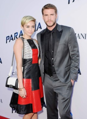 LOS ANGELES, CA - AUGUST 08: Singer Miley Cyrus and actor Liam Hemsworth arrive at the Los Angeles Premiere 'Paranoia' at DGA Theater on August 8, 2013 in Los Angeles, California. (Photo by Jon Kopaloff/FilmMagic)
